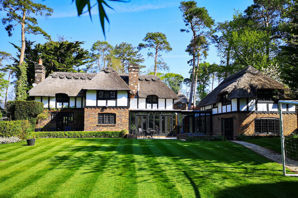 locally listed arts and crafts thatched house surrey